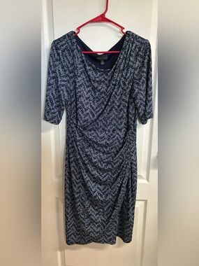 Dress for Interviews
Navy Print
Size 12, runs small
Draped Knee-Length Dress